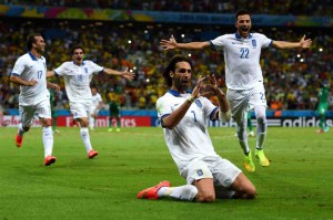 Georgios Samaras celebrates screwing up my bracket by scoring a late PK against Ivory Coast to send Greece (or Grease, as a friend of mine saw it on the closed captioning).